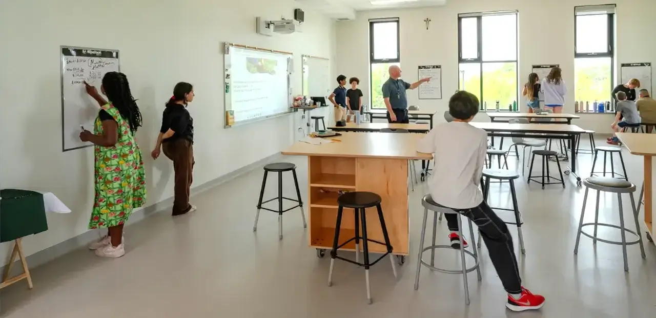 High school students and teacher at desks