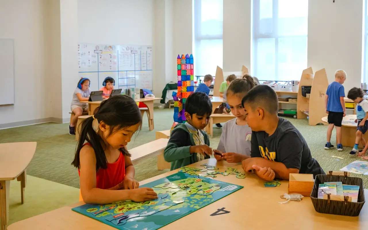 Learners at activity table playing