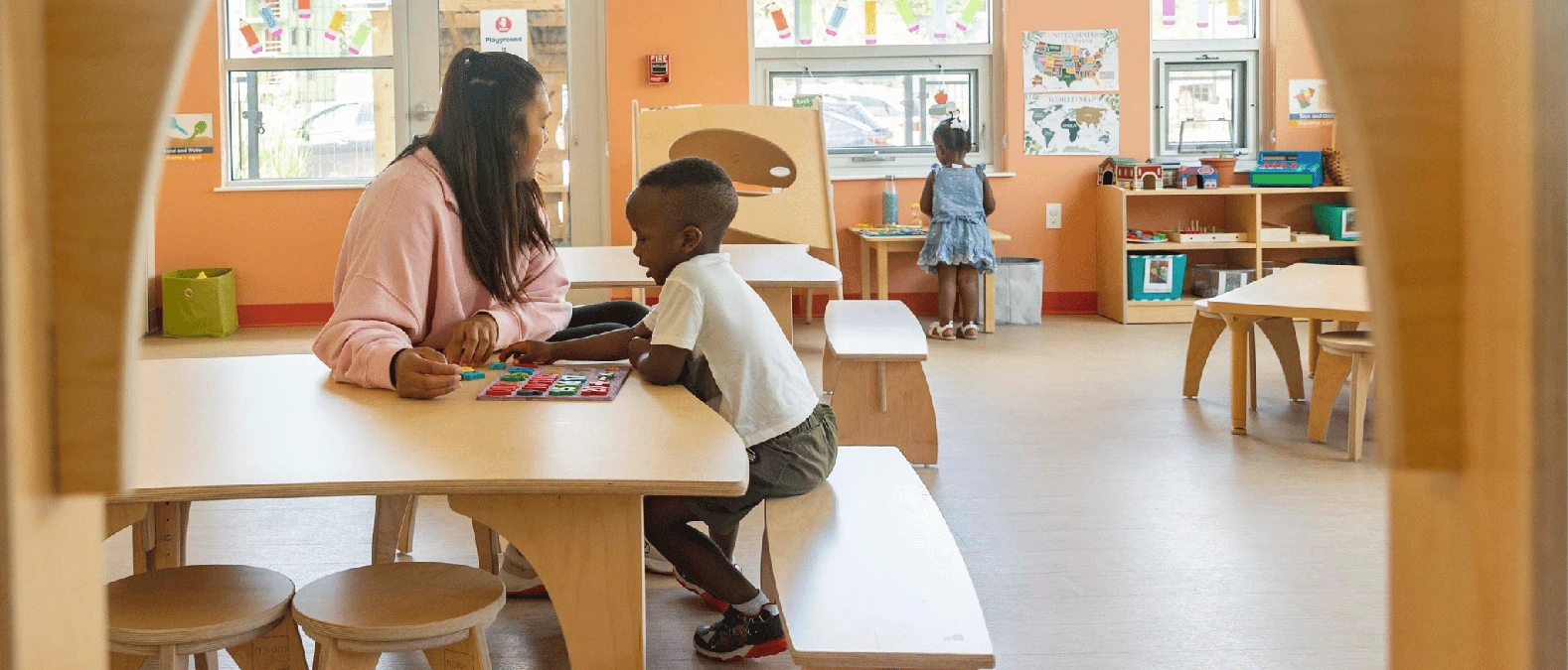 Photo of Learner and Teacher on Certified B Corporation Natural Pod Bench and Table